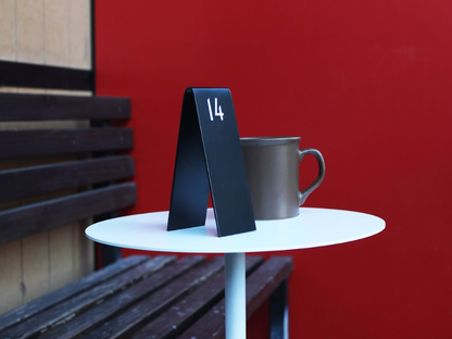 Double-sided Custom Table Number Stackers designed for weddings, cafes, and restaurants. Available with QR code printing and customizable in metal or wood to match any business aesthetic.
