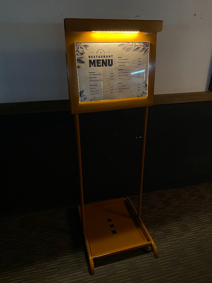The Sidewalk Led Menu Stand provides an effective way to showcase your brand, attract attention, and drive foot traffic. Whether you’re a small café, a large retail store, or an event organizer, this stand is perfect for any outdoor setting. The stand is designed to withstand outdoor elements, including wind and rain, ensuring your display remains secure and visible. With its customizable space for menus, promotions, and messages, the Sidewalk Led Menu Stand helps businesses stay relevant and visible to cus