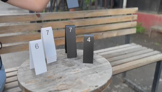 Double-sided Custom Table Number Stackers designed for weddings, cafes, and restaurants. Available with QR code printing and customizable in metal or wood to match any business aesthetic.