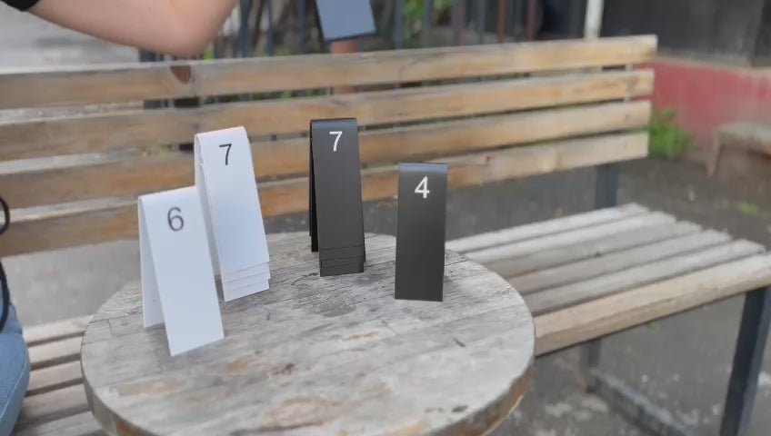 Double-sided Custom Table Number Stackers designed for weddings, cafes, and restaurants. Available with QR code printing and customizable in metal or wood to match any business aesthetic.