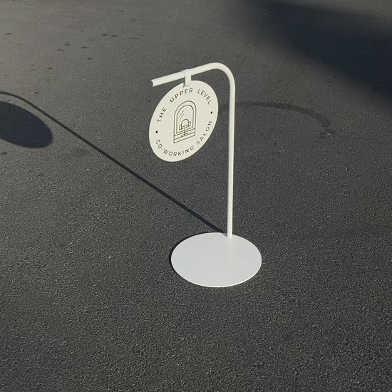 Round panel sidewalk sign with personalized printing options. Great for restaurants and boutiques, offering a stylish and effective way to attract customers.

